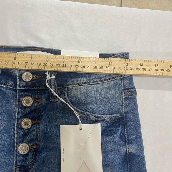 Kancan Medium Wash Five
Button Front Distressed Jeans 7/27 - Picture 5 of 9